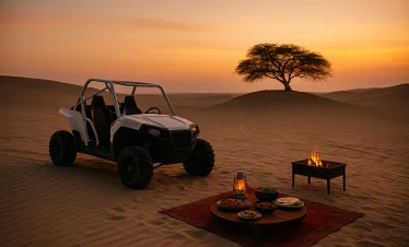 buggy dans le désert de Bahreïn au coucher du soleil avec barbecue et arbre de vie en arrière-plan